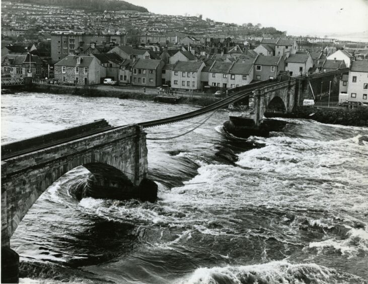 Part of the railway bridge collapsed, leaving the line hanging unsupported in February 1989