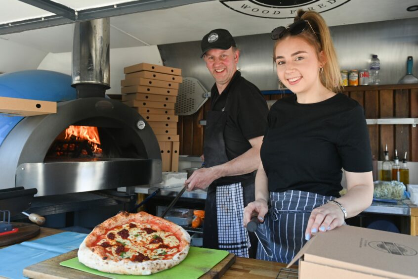 Owner Alistair Adams and Nicola Cameron in their Inverness food truck Blazin' Pizza.