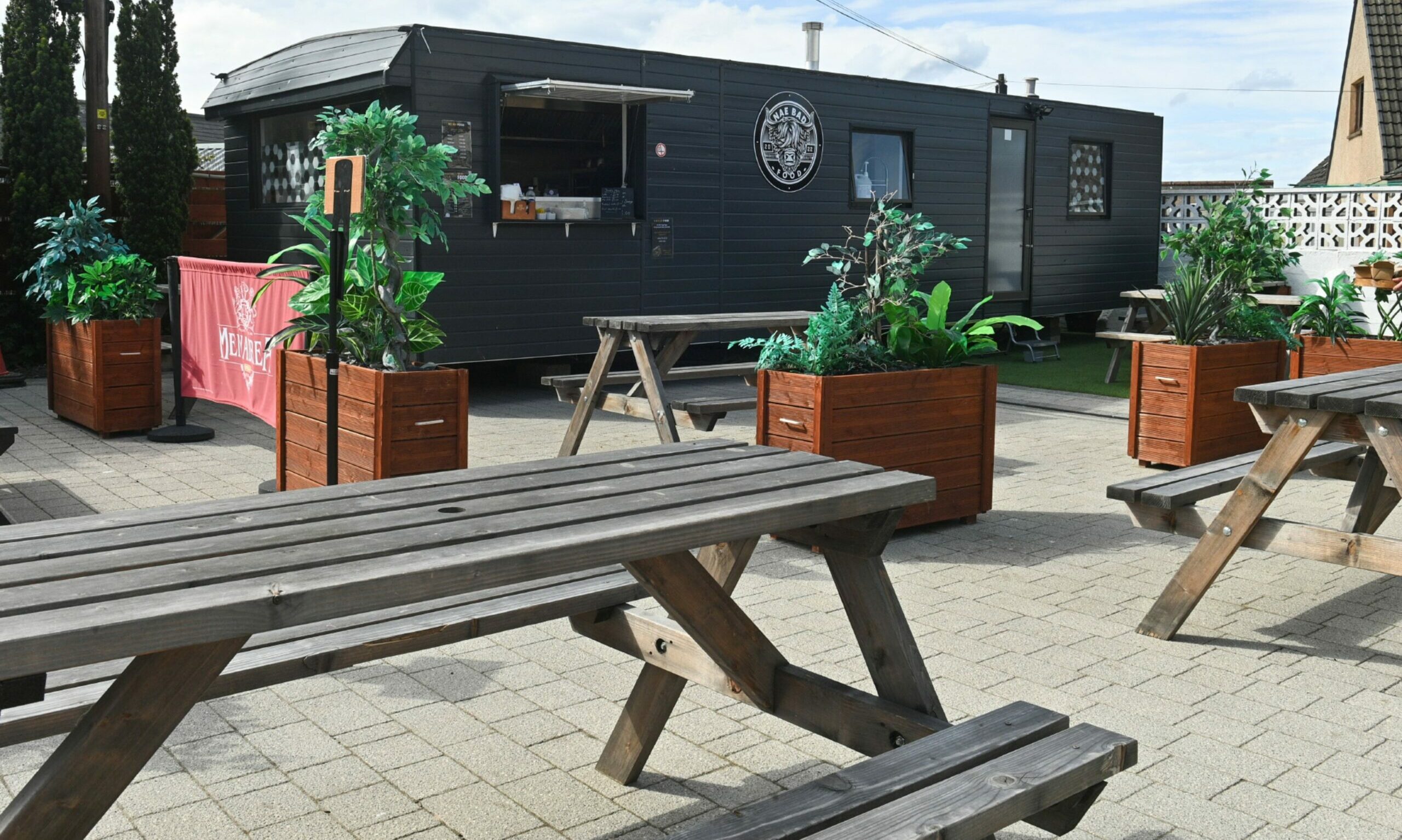 View of Kirkie beer garden looking towards Nae Bad Food caravan. 