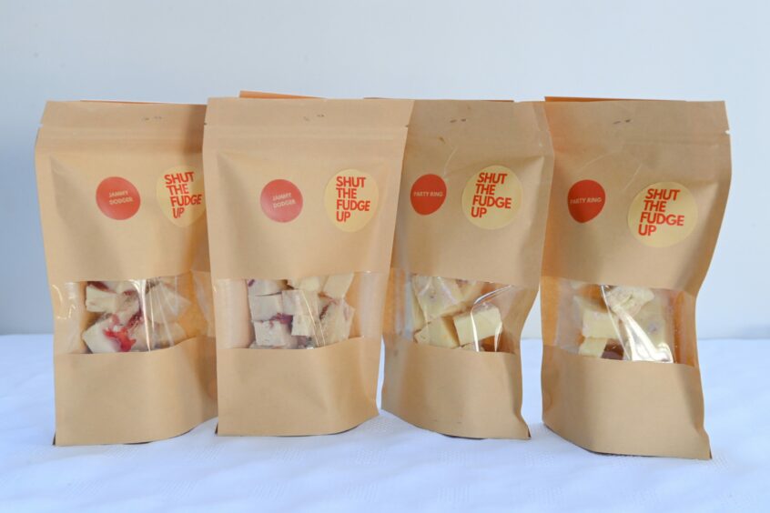 A variety of flavours of Shut The Fudge Up fudge pouches
