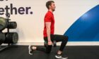 Scott Woods shows how to do a lunge with weights.
