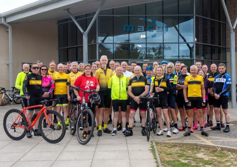 A crowd of people who turned up to the cycle to honour Iain Masson
