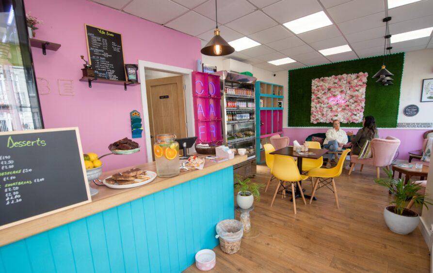The interior of Vibe, including colourful walls, furniture and decor.