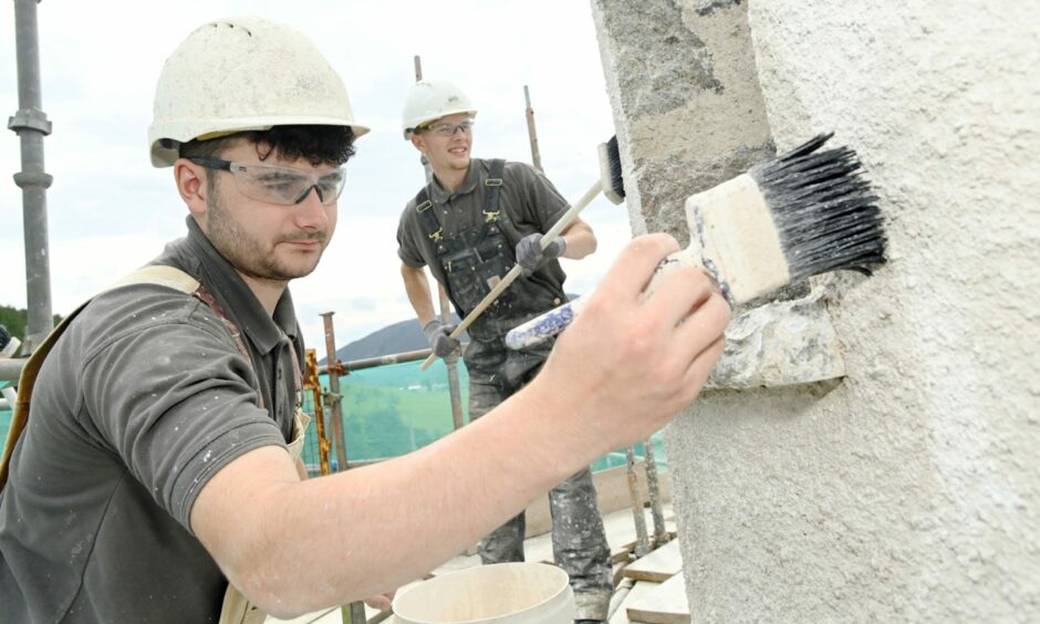 Masonry apprentices Callum Insch and Jolyon Riley, working at Braemar Castle for Keith firm Harper & Allan.