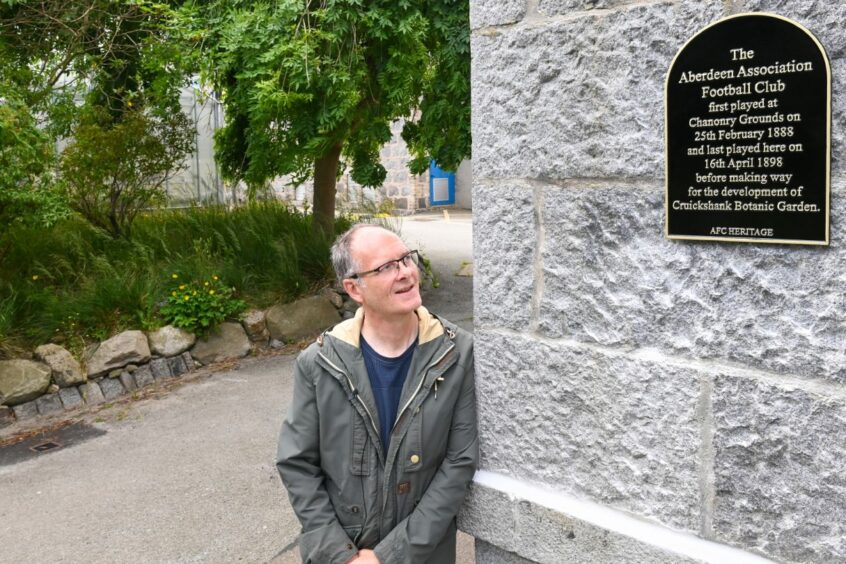 Stewart Eaton at the installed plaque.