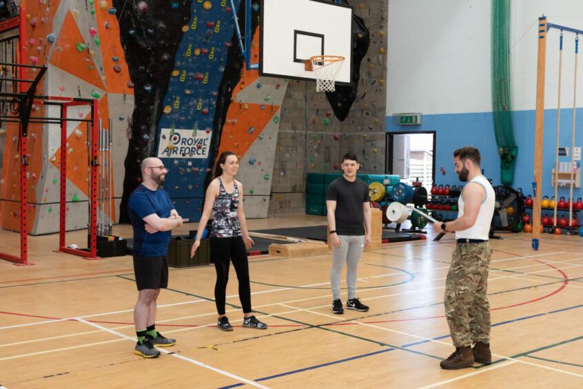 Getting briefed by physical Training Instructor Cpl Jamie Pollock as part of the RAF Lossiemouth fitness test