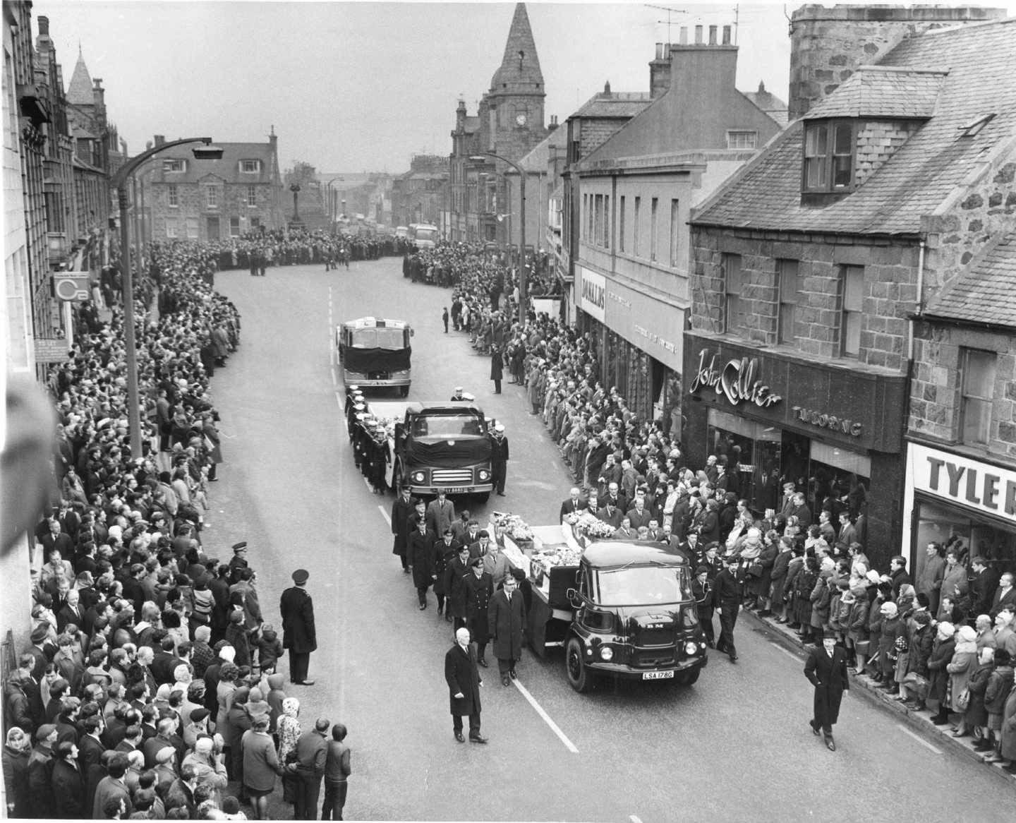 Looking down on the vast crowds in Broad Street, Fraserburgh, during the brave men's funeral cortege in 1970. 