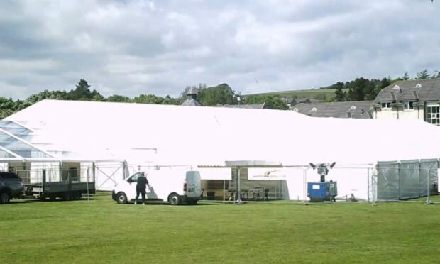 The marquee in progress.