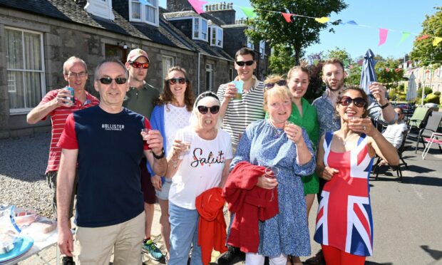 Dozens gathered on Victoria Street in Aberdeen for colourful celebration of the Queen's Platinum Jubilee. Picture by Paul Glendell/DCT Media.