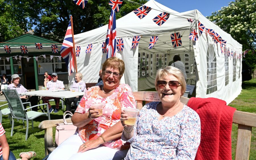Ballater residents Pat Crawford and Sheila Macfarlane at the Big Jubilee Lunch on the Green last summer.