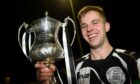 Wick Academy captain Alan Farquhar, pictured with the North of Scotland Cup, has his testimonial tomorrow