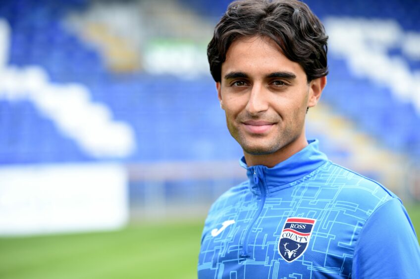 Midfielder Yan Dhanda is eager to get cracking at Ross County.