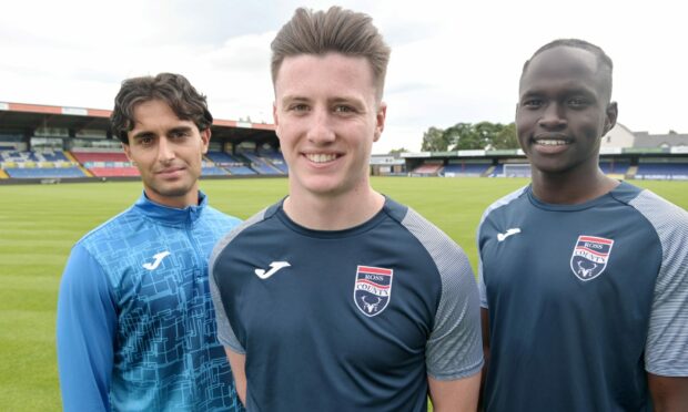 George Harmon with Yan Dhanda and Victor Loturi, who all joined Ross County last week.