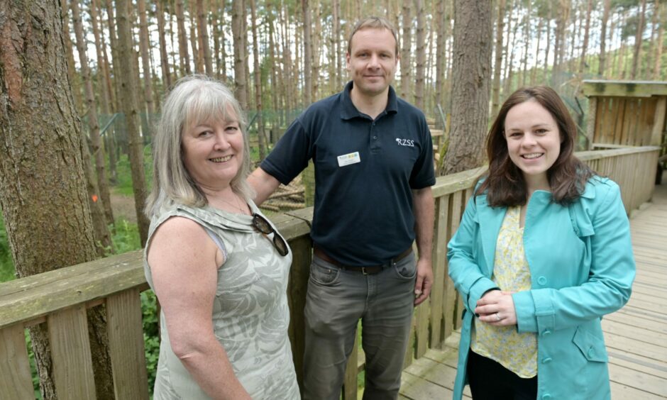 MSPs Rhoda Grant (left) and Kate Forbes are shown around the Highland Wildlife Park by hoofstock keeper Andy Tonge. 