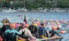 Hundreds of people took to the Kessock Ferry Swim at the weekend, raising thousands for charity. Pic: Sandy McCook/DCT Media
