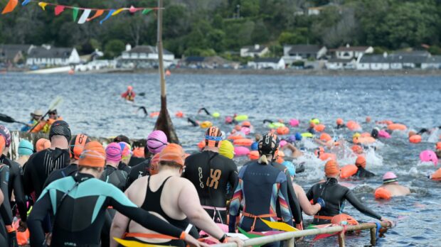 Hundreds of people took to the Kessock Ferry Swim at the weekend, raising thousands for charity. Pic: Sandy McCook/DCT Media