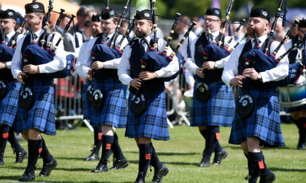 Piping Inverness attracted crowds fo Bught Park. Image: Sandy McCook/DC Thomson