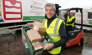 Hauliers like Williamson Foodservice are already helping supply communities in need with food - but what could your business do as part of The Big Food Appeal? Pictured: Gary Williamson, managing director, with dispatch coordinator Andy Mitchell.