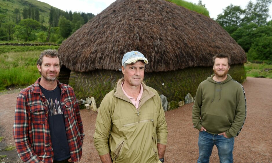 Craftsmen Peter Holmes, of Kilchoan, Brian Wilson, of Ullapool and Mark Thacker, of Carloway, Lewis who worked on the turf house.
