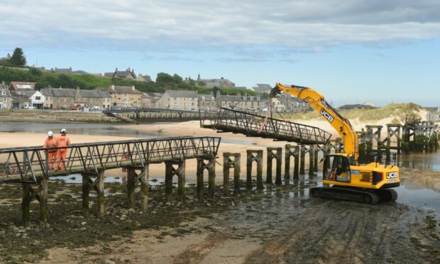 The bridge is being deconstructed. Picture by Sandy McCook.