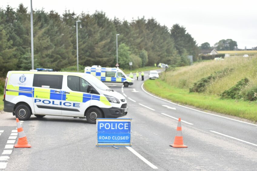 The emergency services at the crash on the A948 Ellon to Auchnagatt Road at its junction with Golf Road, just north of Ellon.