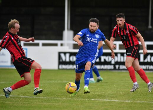 Ryan Dow in action for Peterhead against Inverurie Locos. Picture by Duncan Brown