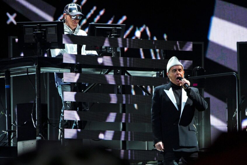 Chris Lowe and Neil Tennant of the Pet Shop Boys performing on The Other Stage at the Glastonbury Festival.