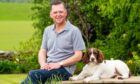 Stanley Morrice celebrates news of his MBE with his beloved Springer Spaniel, Pebbles