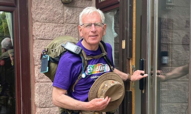 Stuart Nelson ready to travel to Paris for his trek.