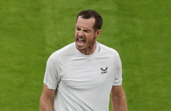 Andy Murray celebrates victory in his match against James Duckworth during day one of the 2022 Wimbledon Championships at the All England Lawn Tennis and Croquet Club, Wimbledon. Picture date: Monday