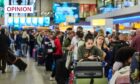 People queue in the departure hall at Schiphol airport in Amsterdam (Photo: Phil Nijhuis/EPA-EFE/Shutterstock)
