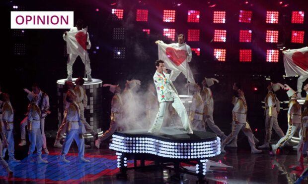 Singer Mika performing during the Eurovision Song Contest 2022 in Italy (Photo: Nderim Kaceli/ipa-agency .net/Shutterstock)