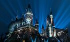 The night-time lights at Hogwarts Castle.
