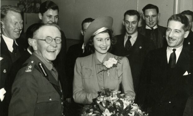 1944 - Lord Provost Sir Thomas Mitchell, Princess Elizabeth and Lord Inverclyde with young sailors after the ceremony to open the Aberdeen Sailors’ Home – one of the future Queen’s first public engagements on her own.