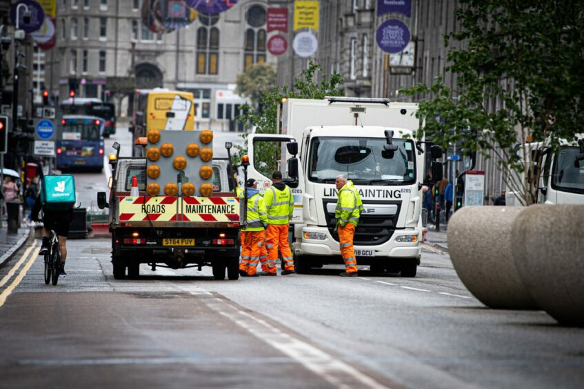 Work to undo the Covid-prompted closure of Aberdeen's Union Street is under way. Picture by Wullie Marr/DCT Media.