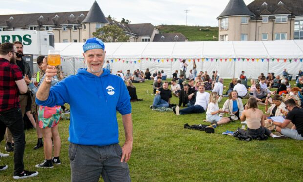 Organiser Robert Lindsay celebratingat the Midsummer Beer Happening in 2022. Image: Wullie Marr / DC Thomson.