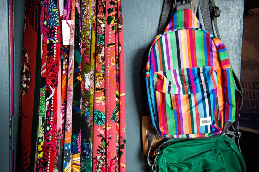Colourful scarves and bags.