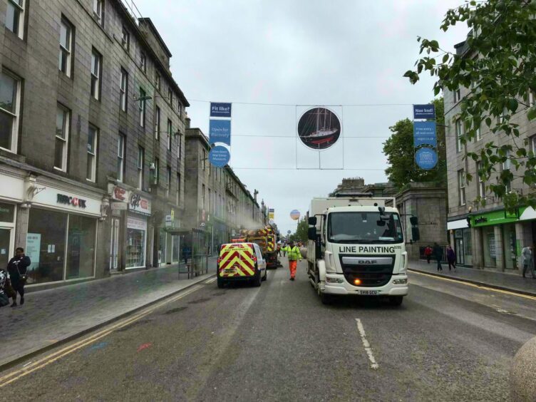 Work to undo the Covid-prompted closure of Aberdeen's Union Street is under way. Picture by Ben Hendry/DCT Media.