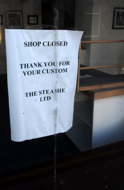 Sign attached to window of Steamie saying "shop closed, thank you for your custom". 