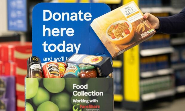 Volunteers are needed to help with Tesco's milestone food collection. Supplied by Tesco.