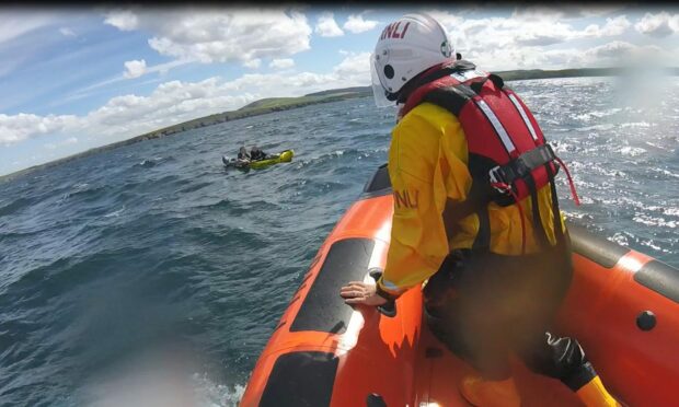 Macduff voluntary lifeboat crews assisting stranded kayakers. Supplied by Macduff RNLI.