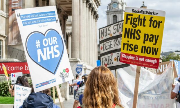 NHS workers marched on Trafalgar Square, London, in 2020, threatening strike action and calling for better pay.