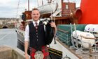 Jamie MacGregor piped into Oban the first passengers. Picture supplied by Waverley.