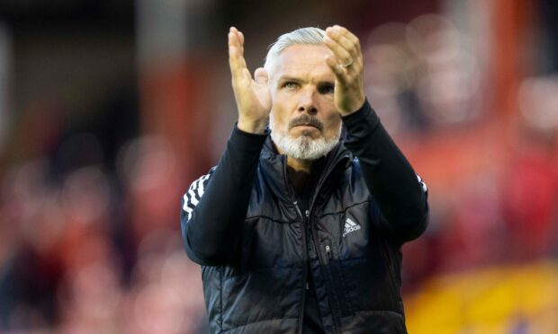 Jim Goodwin insists he has signed players with no egos but big characters