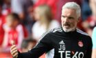 Aberdeen manager Jim Goodwin wants his defence to tighten up for Celtic clash.