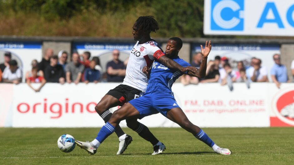 Ola Adeyemo, right, in action for Peterhead against Aberdeen. Image: SNS