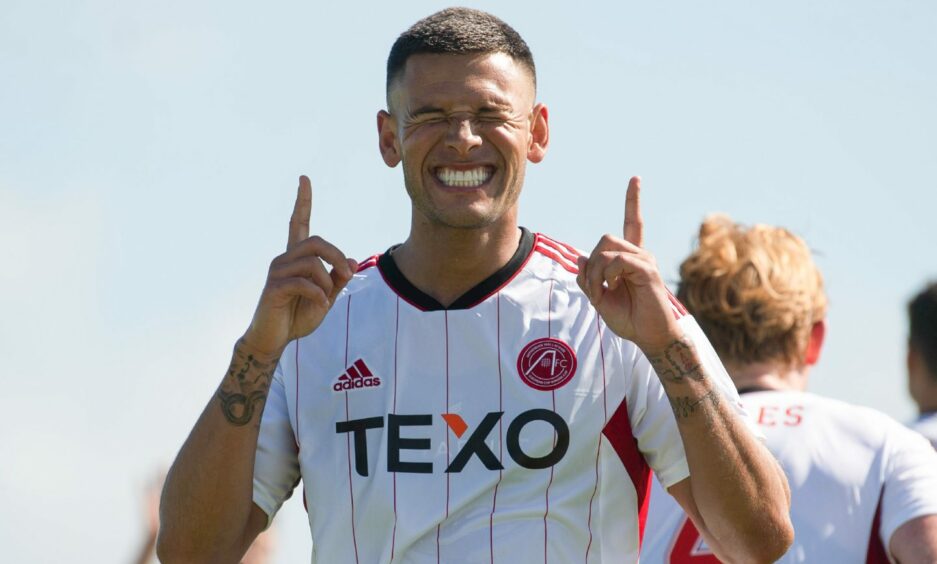 Aberdeen's Christian Ramirez celebrates after making it 1-0 against Peterhead