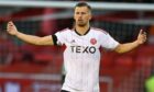 Albanian international midfielder Ylber Ramadani in action for Aberdeen.