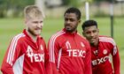 Aberdeen summer signings Hayden Coulson (l), Luis Lopes and Jayden Richardson (r) during a training session.