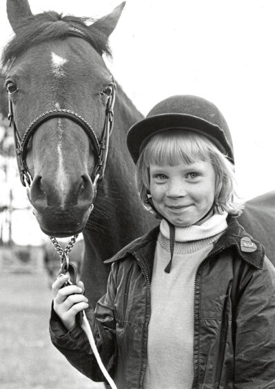 A girl and her horse at the echt show